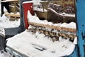 Vintage Piano musical instrument under the snow. Royalty Free Stock Photo