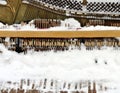 Vintage Piano musical instrument under the snow. Royalty Free Stock Photo