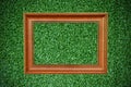 Vintage picture frame on beautiful green grass Royalty Free Stock Photo