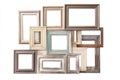Vintage Picture Frames Arrangement on White Background A collection of vintage picture frames arranged in a random overlapping