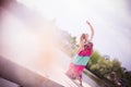 Vintage picture of gracious young woman dancing by