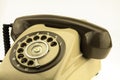 Vintage picture style of new smart phone with old telephone on white background. New communication technology Royalty Free Stock Photo