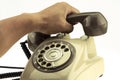 Vintage picture style of new smart phone with old telephone on white background. New communication technology Royalty Free Stock Photo