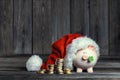 Vintage Piggy Bank with Santa Claus hat Royalty Free Stock Photo