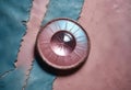 Vintage pink leather background with crystal button Royalty Free Stock Photo