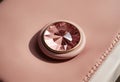 Vintage pink leather background with crystal button Royalty Free Stock Photo