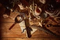 Pirate still life with candle, compass, dark rum in a skull bottle and old papers