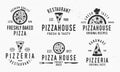 Vintage Pizza logotypes isolated on white background. Pizzeria emblems set with pizza slices, chef hat, knife, fork and grunge tex Royalty Free Stock Photo