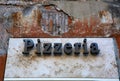 Vintage pizzeria sign in Italy Royalty Free Stock Photo