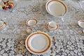 Vintage Place Settings on Laced Tablecloth