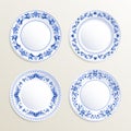 Vintage plates painted at gzhel style. Vector pictures of russian dishes