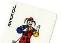 Vintage playing card showing a close up of the joker.. Royalty Free Stock Photo
