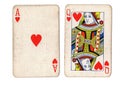 Vintage playing cards showing an ace and queen of hearts. Royalty Free Stock Photo
