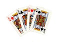 Vintage playing cards showing four kings.