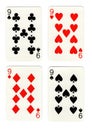 Vintage playing cards showing four nines.