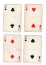 Vintage playing cards showing four twos. Royalty Free Stock Photo