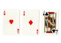 Vintage playing cards showing a pair of aces and a jack. Royalty Free Stock Photo