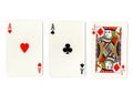 Vintage playing cards showing a pair of aces and a jack. Royalty Free Stock Photo