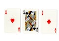 Vintage playing cards showing a pair of pair of aces and a queen. Royalty Free Stock Photo