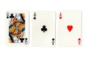 Vintage playing cards showing a pair of pair of aces and a queen. Royalty Free Stock Photo