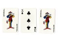 Vintage playing cards showing a pair of aces and a three. Royalty Free Stock Photo