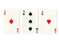 Vintage playing cards showing a pair of aces and a three. Royalty Free Stock Photo
