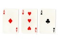 Vintage playing cards showing a pair of aces and a three. Royalty Free Stock Photo