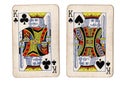 Vintage playing cards showing a pair of kings. Royalty Free Stock Photo