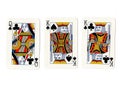 Vintage playing cards showing a pair of pair of kings and a queen. Royalty Free Stock Photo