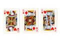 Vintage playing cards showing a pair of pair of kings and a queen. Royalty Free Stock Photo