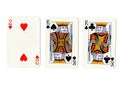 Vintage playing cards showing a pair of kings and a two. Royalty Free Stock Photo