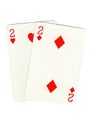 Vintage playing cards showing a pair of red twos. Royalty Free Stock Photo