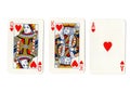 Vintage playing cards showing a queen, king and ace of hearts. Royalty Free Stock Photo