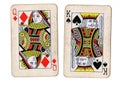 Vintage playing cards showing a queen and king.