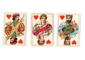 Vintage playing cards showing a run of jack, queen and king of hearts. Royalty Free Stock Photo