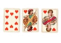 Vintage playing cards showing a run of a ten, jack and queen of hearts. Royalty Free Stock Photo
