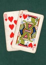 Vintage playing cards showing a ten and jack of hearts. Royalty Free Stock Photo