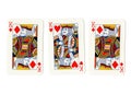 Vintage playing cards showing three red kings. Royalty Free Stock Photo