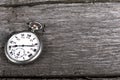 Vintage pocked watch on wood Royalty Free Stock Photo