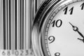 Vintage pocket watch in focus, barcode on the background, conceptual time for shopping image