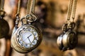 Vintage Pocket Watchs Hanged with Chains in an Antique Shop Royalty Free Stock Photo