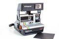 Vintage Polaroid camera on white background