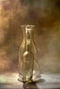 Vintage pontil type bottles on rustic backdrop studio shot Lokgram Kalyan