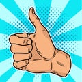 Vintage pop art like. A positive gesturein social networks. Thumb up in retro style on a blue-bubble background. Vector