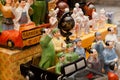 Vintage porcelain figurines of Chinese Communist leaders at antique market traders