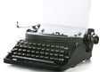 Vintage portable typewriter with paper Royalty Free Stock Photo