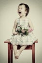 Vintage portrait of crying girl with rose