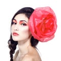 Vintage portrait of fashion glamour girl with red flower in her Royalty Free Stock Photo