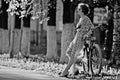 Vintage portrait of a girl with bike Royalty Free Stock Photo