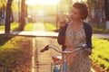 Vintage portrait of a girl with bike Royalty Free Stock Photo